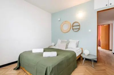 Łóżko lub łóżka w pokoju w obiekcie Union Square, 3 sypialnie, centrum, balkon, kawa
