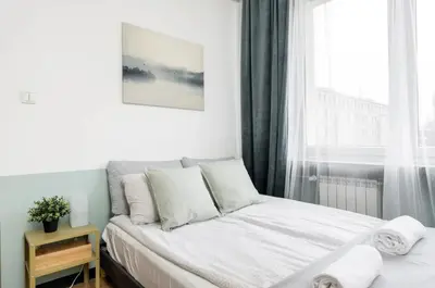 Łóżko lub łóżka w pokoju w obiekcie Union Square, 3 sypialnie, centrum, balkon, kawa