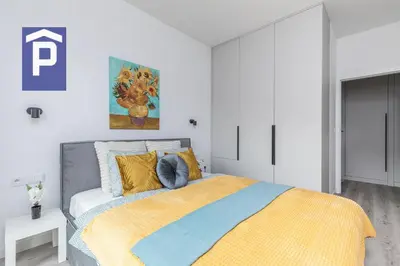 Łóżko lub łóżka w pokoju w obiekcie SuperApart Herbu Janina 4, Wilanów, szpital Medicover, Paley, parking