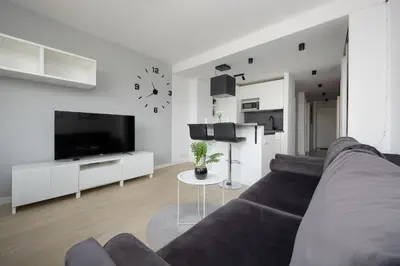 Telewizja i/lub zestaw kina domowego w obiekcie Marszałkowska Stylish Apartments with Balcony Warsaw Center by Noclegi Renters