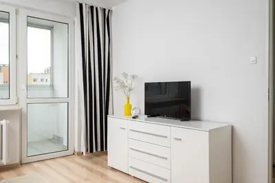 Telewizja i/lub zestaw kina domowego w obiekcie Praga Łukowska Cosy Apartment by BookingHost