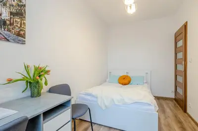 Łóżko lub łóżka w pokoju w obiekcie ShortStayPoland Skierniewicka (B156)