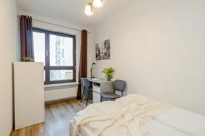 Łóżko lub łóżka w pokoju w obiekcie ShortStayPoland Skierniewicka (B156)