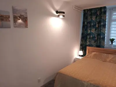 Łóżko lub łóżka w pokoju w obiekcie City Center-Złota str.