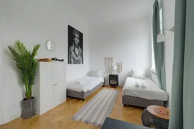 Łóżko lub łóżka w pokoju w obiekcie TOP Place*Unique Royal Route View*4 Bedrooms*6Beds