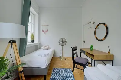 Łóżko lub łóżka w pokoju w obiekcie TOP Place*Unique Royal Route View*4 Bedrooms*6Beds