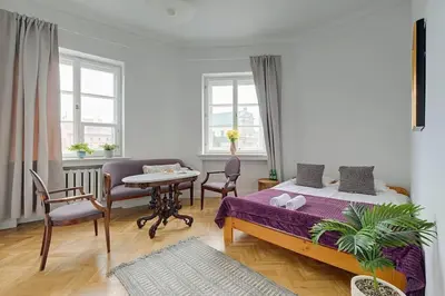 Łóżko lub łóżka w pokoju w obiekcie TOP Place*Unique Royal Route View*4 Bedrooms*6Beds