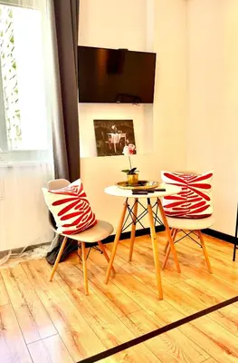 Telewizja i/lub zestaw kina domowego w obiekcie Nice 1Room Condo WarszawaCenter