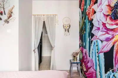 Łóżko lub łóżka w pokoju w obiekcie Boho Chic City Center