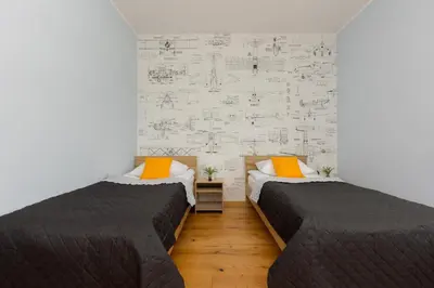 Łóżko lub łóżka w pokoju w obiekcie 2 Bedroom Apartment Beautiful Green Surroundings Międzyborska Street by Noclegi Renters