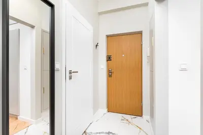 Łóżko lub łóżka w pokoju w obiekcie Aleje Jerozolimskie 42 by Homeprime