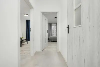 Łóżko lub łóżka w pokoju w obiekcie Modern Targowek Apartment by Noclegi Renters
