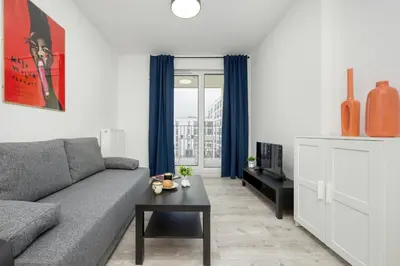 Część wypoczynkowa w obiekcie Modern Targowek Apartment by Noclegi Renters