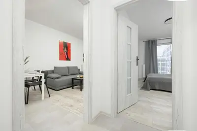 Część wypoczynkowa w obiekcie Modern Targowek Apartment by Noclegi Renters