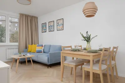 Część wypoczynkowa w obiekcie Beautiful & Bright Walowa Apartments with Balcony by Noclegi Renters