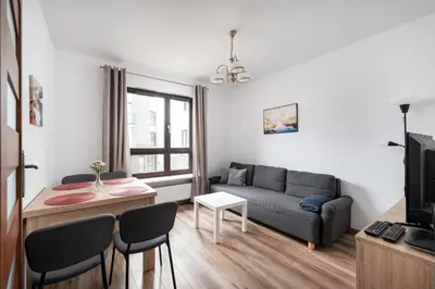 Część wypoczynkowa w obiekcie Metro Płocka Cosy Apartment by BookingHost