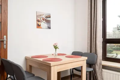 Część wypoczynkowa w obiekcie Metro Płocka Cosy Apartment by BookingHost