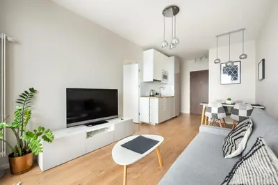 Telewizja i/lub zestaw kina domowego w obiekcie Business Mokotów Park 84 Apartment by BookingHost