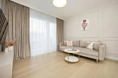 Część wypoczynkowa w obiekcie Stylish Apartment with Balcony 7th Floor by Noclegi Renters
