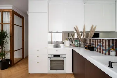 Kuchnia lub aneks kuchenny w obiekcie Hoża Modern Apartment by BookingHost