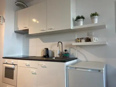 Kuchnia lub aneks kuchenny w obiekcie Apartament Modlińska
