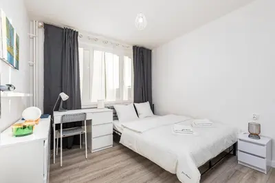 Łóżko lub łóżka w pokoju w obiekcie Apartament Puławska by Your Freedom