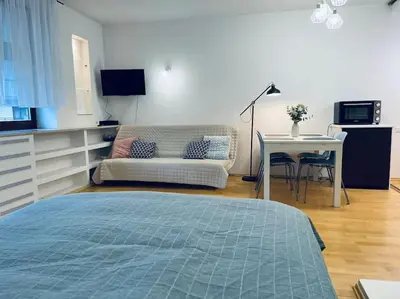 Łóżko lub łóżka w pokoju w obiekcie Shiraz Garden Studio