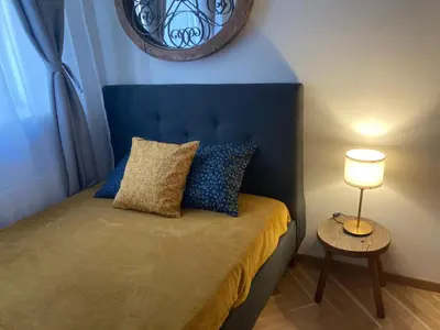 Łóżko lub łóżka w pokoju w obiekcie Murano Apartments Piękna 16A