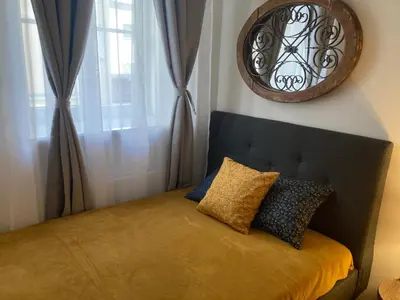 Łóżko lub łóżka w pokoju w obiekcie Murano Apartments Piękna 16A