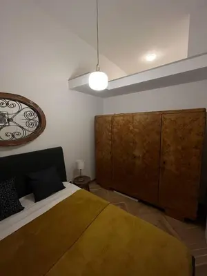 Łóżko lub łóżka w pokoju w obiekcie Murano Apartments Piękna 16A