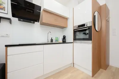 Kuchnia lub aneks kuchenny w obiekcie Holzera 3 studio - close to Medicover/Paley