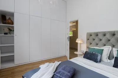 Łóżko lub łóżka w pokoju w obiekcie Woronicza Premium Complex