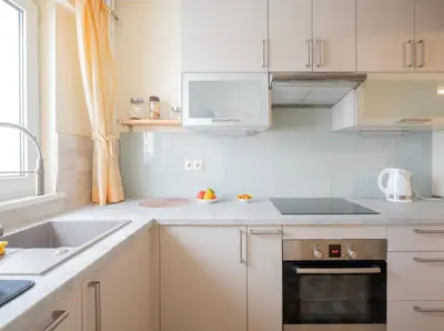 Kuchnia lub aneks kuchenny w obiekcie First Green Żoliborz Apartment 9