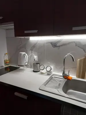 Kuchnia lub aneks kuchenny w obiekcie Royal Park Apartament