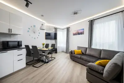 Telewizja i/lub zestaw kina domowego w obiekcie Mokotów Nowe Południe Chic Apartment by BookingHost