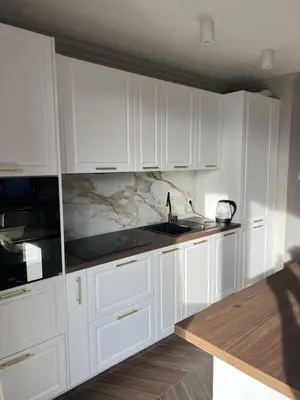 Kuchnia lub aneks kuchenny w obiekcie Wiatraczna Glamour Apartment