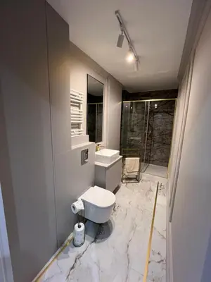 Łazienka w obiekcie Wiatraczna Glamour Apartment