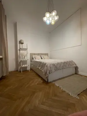 Łóżko lub łóżka w pokoju w obiekcie Apartament Plac Unii Lubelskiej