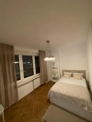 Łóżko lub łóżka w pokoju w obiekcie Apartament Plac Unii Lubelskiej