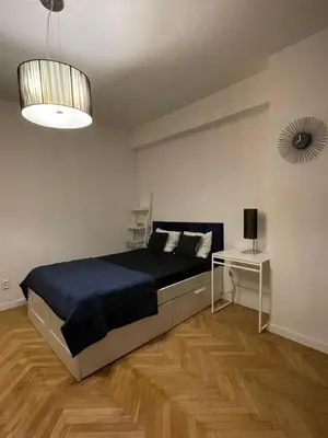 Łóżko lub łóżka w pokoju w obiekcie Apartament Plac Unii Lubelskiej