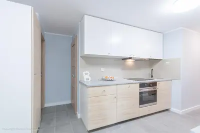 Kuchnia lub aneks kuchenny w obiekcie SuperApart Starościńska ROOMs