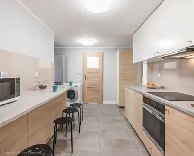 Kuchnia lub aneks kuchenny w obiekcie SuperApart Starościńska ROOMs
