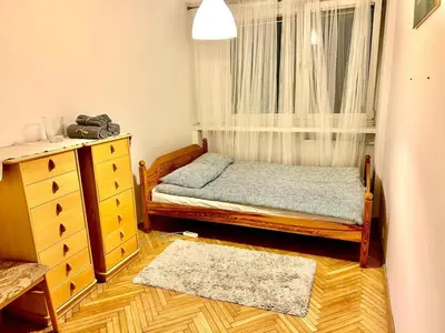Łóżko lub łóżka w pokoju w obiekcie YOURAPART ŚLISKA