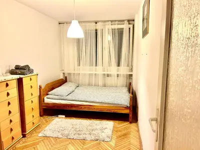 Łóżko lub łóżka w pokoju w obiekcie YOURAPART ŚLISKA