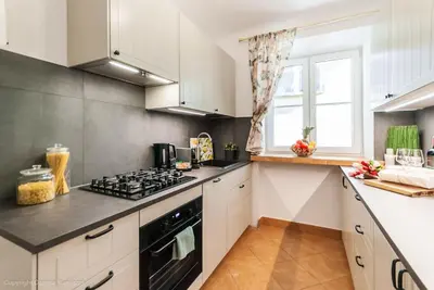 Kuchnia lub aneks kuchenny w obiekcie SuperApart Świętojańska 19, Old Town