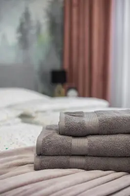 Łóżko lub łóżka w pokoju w obiekcie WARSZAWSKI SEN. Apartament na 5