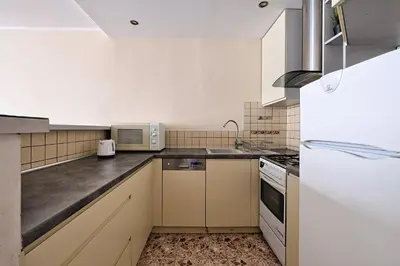 Kuchnia lub aneks kuchenny w obiekcie UrbanNest_Pereca