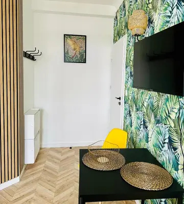 Telewizja i/lub zestaw kina domowego w obiekcie Olivia Apartments - Słoneczny apartament w centrum Warszawy, Plac Unii Lubelskiej, Łazienki Królewskie, Pole Mokotowskie - 24h check-in