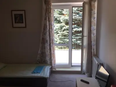 Łóżko lub łóżka w pokoju w obiekcie Wilanowska Hostel