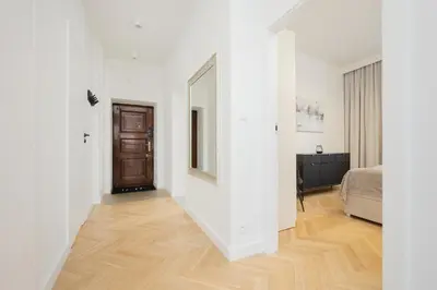 Łóżko lub łóżka w pokoju w obiekcie Charming Apartment Plac Zamkowy in Warsaw Old Town by Noclegi Renters